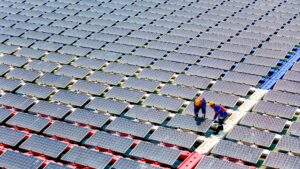 Floating solar panels providing renewable energy. Aerial view floating on solar cells and